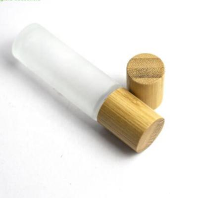 China Frost 10ML Cosmetic Empty Roll On Bottle Frosted Glass Perfume Oil Bottle With Bamboo Lid for sale