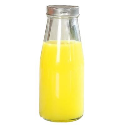 China Glass Transparent Empty Storage Beverage Bottle And Glass Juice Drink Bottle With Aluminum Caps for sale