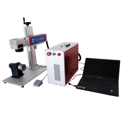 China Laser Engraving 10w/20w/30w High Speed ​​Table Type Fiber Laser Marking Machine For Marking Metal for sale