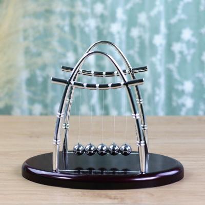 China 2022 Hot Selling Custom Black Bottom Arched Soft Toy Newton Cradle Balance Ball For Gift Can Print Logo for sale