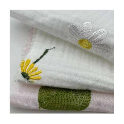 China Sustainable New Design High Quality 100% Cotton Three Layers Crepe Gauze Embroidered Muslin Fabric for sale