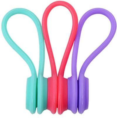 China Multifunctional Earphone Earphone Wire Winder Removable Self Locking Elastic Magic Twist Lock Silicone Cable Tie With Label for sale