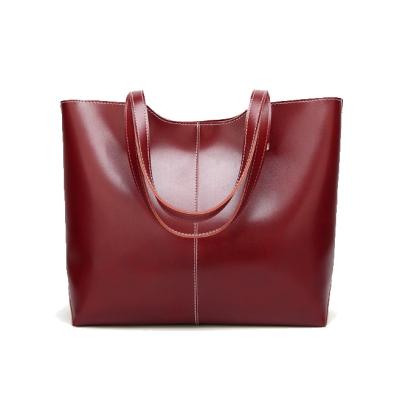 China Stylish Casual Waterproof Women's Bag The Retro Normcore Shoulder Bag Fashion Oil Waterproof Simple Soft Leather Handbag for sale