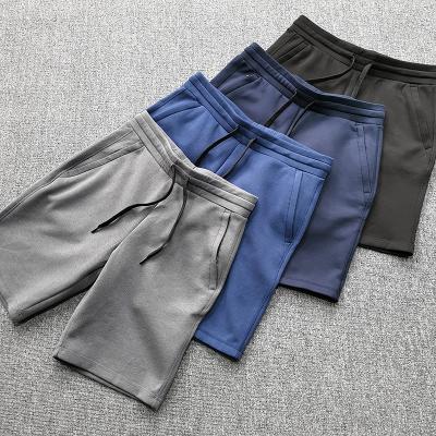 China Anti-Wrinkle Manufacturers Wholesale Simple High Quality Mens Gym Shorts With Pockets 2021 Cheap Breathable Polyester Men Shorts Joggers for sale