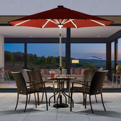 China Sun Wind Rain Proof Solar Panel Powered Aluminum Polyester LED Lighted Patio Table Market Umbrella with Tilt and Crank for sale