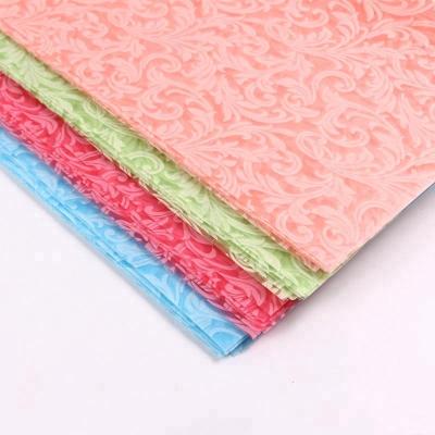 China Anti-bacteria Embossed PP Spunbond Iris Pattern Non Woven Nonwoven Fabric For Wrapping Flowers for sale