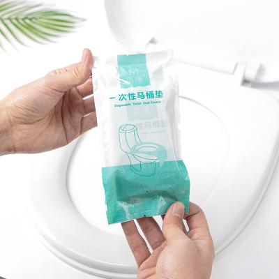 China Public Toilet Seats Individually Wrapped Travel Portable With Adhesive Toilet Seat Covers Mats Covers Disposable Pe Toilet Film for sale