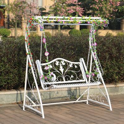 China New Modern Metal/Iron Double Seat Outdoor Art Garden Swing Hanging Garden Swing Chairs Vintage Wrought Iron Double Patio Swing Chair for sale