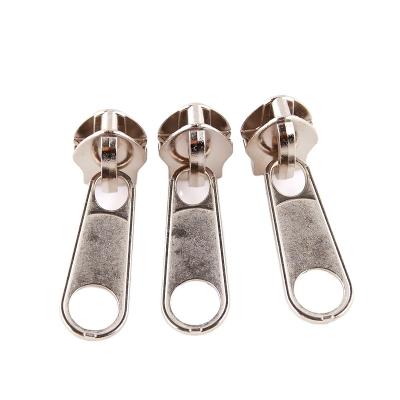 China Latest Dawei brand design clothing accessories metal slider reversible custom metal zipper slider nickel free for sale