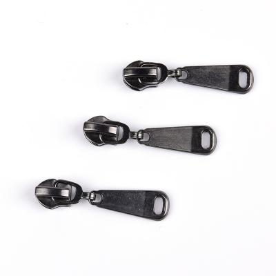 China Dawei Brand Nickel Free Size 5# 7slider Custom Puller Pull Head Pull Head Zipper Puller for Bags/Luggage/Handbag/Clothes/Backpack/Tent for sale