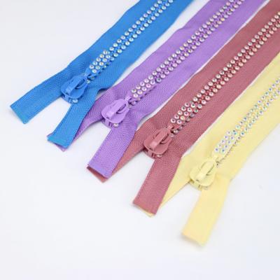 China 2022 Hot Sale 3# 5# 8# Plastic Zipper Reversible 3# 5# 8# Diamond Stone Teeth Zipper for sale