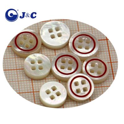 China Dry Cleaning Custom Carving Natural White Pearl Shell Button With Die for sale