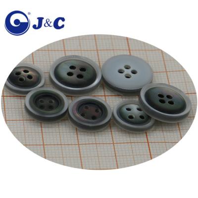 China Natural dry cleaning plastic and black BROOM shell combination buttons, black sea pearl shell buttons. for sale