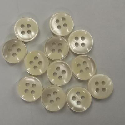 China Washable wholesale high quality 4 holes trocas shell buttons hotting selling custom making for costumes for sale