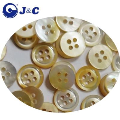 China 4 Viable Holes White Pearlescent Shell Buttons for sale