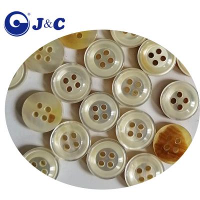 China 4 Viable Holes White Pearlescent Shell Buttons for sale