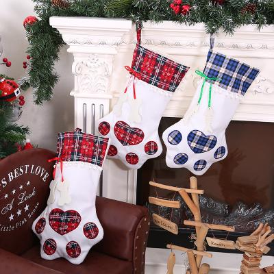 China 2021 Fabric Dog Paw Plaid Sublimation Christmas Stockings Jars Christmas Gift Candy Bag Fireplace Christmas Tree Hanging Decoration for sale