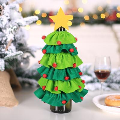 China 2021 Brushed Cloth+Fluffy Ball Red Wine Bag Red Wine Plush Ball Star Wine Rack Party Table Decoration Christmas Wine Bottle Cover Creative for sale