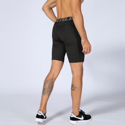 China Popular QUICK DRY Fitness Shorts With Pocket Sports Running Training To Sweat Quick Drying Elastic Tight Shorts For Men for sale