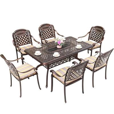 China Contemporary Outdoor Waterproof Garden Table Art And Chairs Yard Garden Leisure Iron Sunproof Table And Chairs for sale