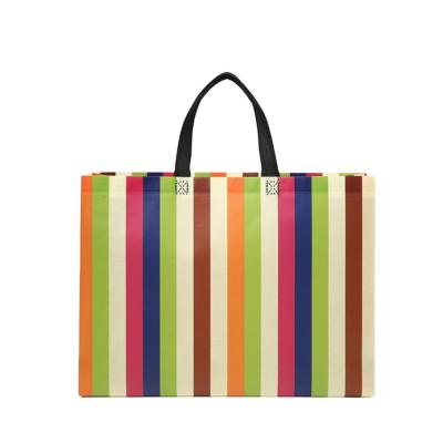 China Recyclable Color Gift Bag Lined Non Woven Shopping Tote Bag for sale