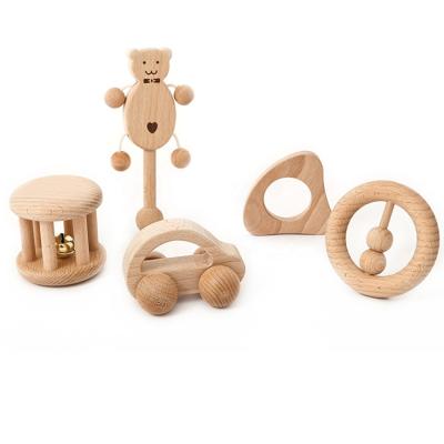 China Eco-friendly Material Puzzle Toys Children's Intellectual Development Montessori Toys Set Wooden Teeth Rattles for sale