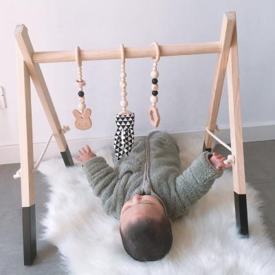 China Educational DIY Toys Activity Baby Hang Than Wooden Sight Fitness Toys Felt Baby Play Gym Crib Toys For Newborn Shower Gift for sale