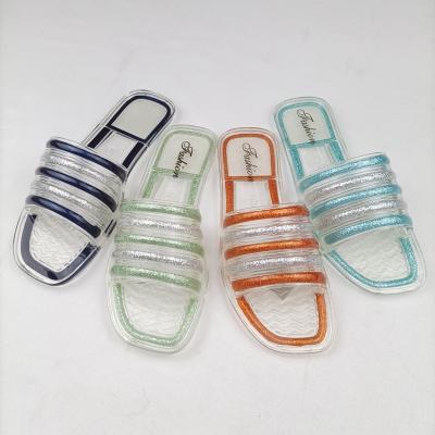 China Ladies Waterproof Sexy Crystal Flat Slippers Shiny PVC Stripes Vamp Flip Flops for sale