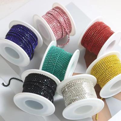 China Flatback ss12 crystal rhinestone bead trim Rhinestone cup chain trimming in roll for sale