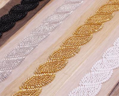 China 3D Hot selling beautiful rhinestone beaded flower pattern bridal lace trim for sale