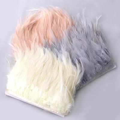 China Shrink-Resistant 15-20cm Natural Rooster saddle Feathers Strung Chicken feathers for Jewelry carnival costumes decoration for sale