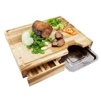 China Sustainable acacia wood cutting board with stainless trays and drawer for kitchen food for sale