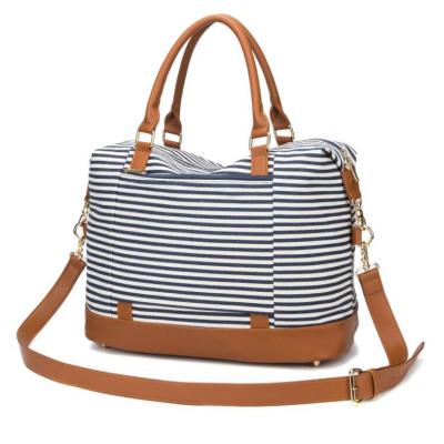 China Fashion Designer Striped Canvas Pu Splicing Portable Foldable Large Travel Unisex Messenger Duffel Bag for sale