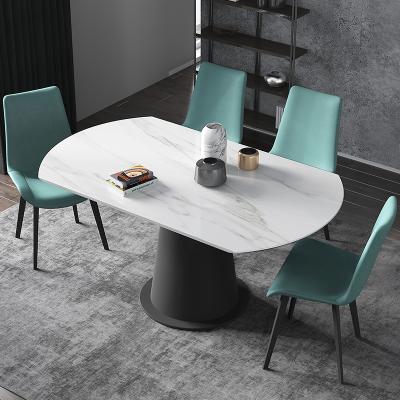 China Nordic minimalist retractable round revolving dining table and rock panel chair combination Italian home extendable for sale