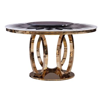 China Italian Modern Minimalist Marble Round Table Extendable Household Dining Table And Chair Combination Mail Stainless Steel for sale