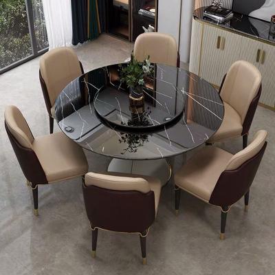 China Light luxury simple postmodern extendable Italian style restaurant rock slab marble round dining table and chair combination for sale