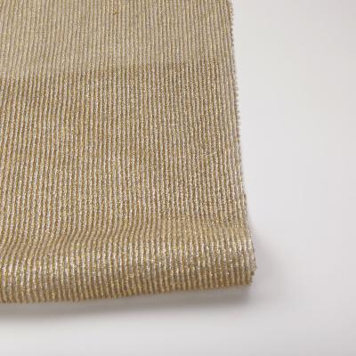 China Custom Knitted Anti Pill Polyester Yarns Dyed Gold and Silver METALLIC YARN Embossed Fabric for Skirt Dress Clothes Garments for sale