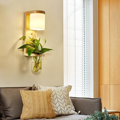 China Modern Nordic Creative Living Room Aisle Balcony Wall Lamp Bedside Green Plant Bedroom Green Art LED Solid Wood Wall Lamp for sale