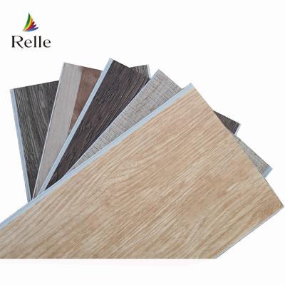 China Hotel Vinyl Spc Click Flooring With Grain Loose Lay And UV Coating for sale