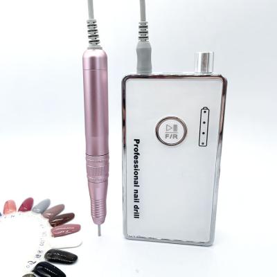 China New design manicure pedicure machine maquina salon manicure cordless nail drill machine 13*7*4cm/13.5*1.8cm brushless nail device for sale