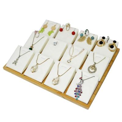 China High Grade Bamboo And Wood Jewelry Display Rack 12 Bit Necklace Storage Tray Jewelry Store Counter Display Ring Earrings Show Props for sale