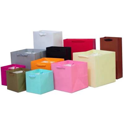 China Recycled Materials Sell Customization Large Square Cake Bakery Breadfruit And Flower Packaging Wholesale Paper Bags With Handles for sale