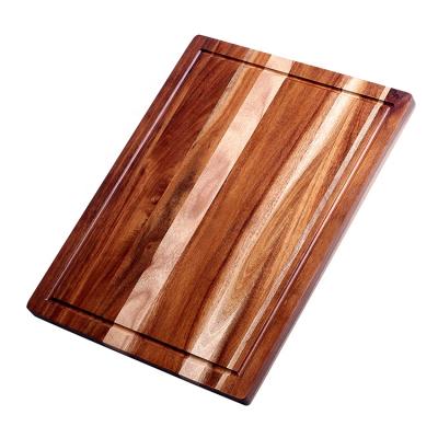 China Sustainable Acacia Wood Cutting Board Chopper Rectangle Board with Hand Grip and Juice Groove for sale