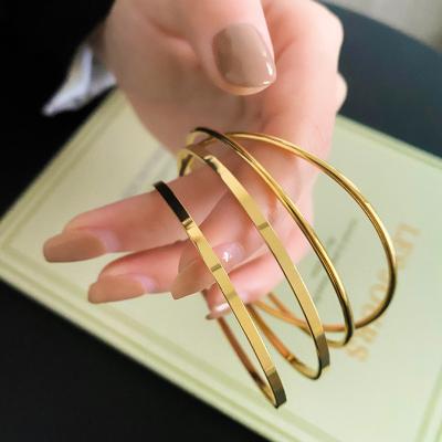 China MICCI Wholesale Custom Ladies Jewelry Fashion 18K Gold Plated Line Coil Cable Wire Circle Bracelet Stainless Steel 2mm 2.4mm Bracelets for sale