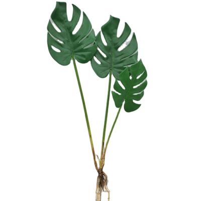 China Low Price Decoration Plastic Foliage Green Plant Home Decor 3 Bifurcated Artificial Monstera Faux Leaves for sale