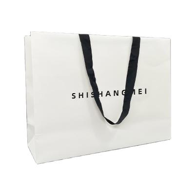 China Branded Boutique Customized Recyclable Logo Luxury Clothing Packaging Gift Shopping Bag Paper Paper Bag for sale