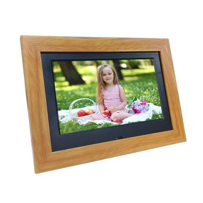 China DPF-W7001 Bulk Multi Clock Video Playback Function Clock Calendar LCD Display 7 Inch Wood Grain Digital Photo Frame for sale