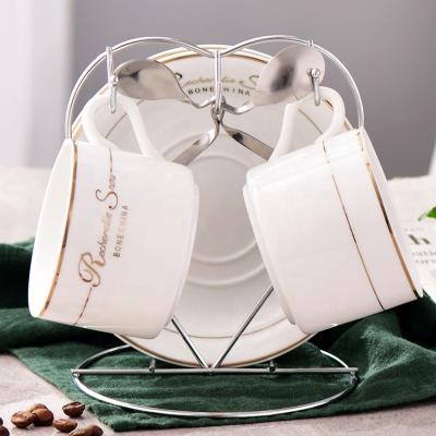 China Amazon Stocked Hot Selling Coffee Mug Set With Metal Stand Gold Rim Tea Cups And Saucers With Silver Stand for sale