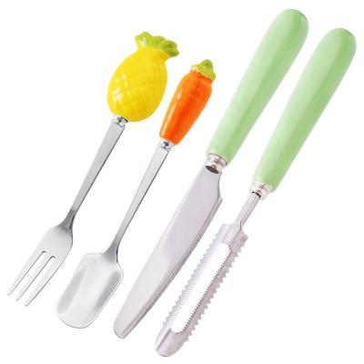 China Beautiful Stocked Ceramic Stainless Steel Fruit Fork Set Dessert Fork Teaspoon for sale