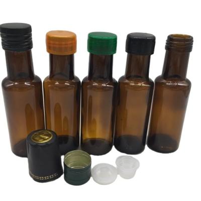 China Amber Mineral Water Bottles 100ml Olive Oil Glass Bottle Empty With Screw Cap for sale